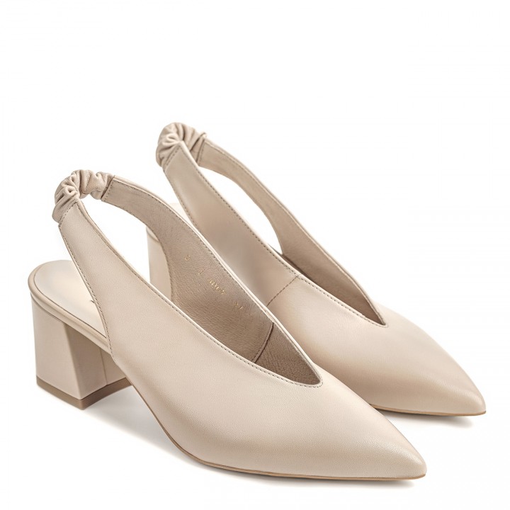 Beige women's pumps with an open heel and a pointed toe