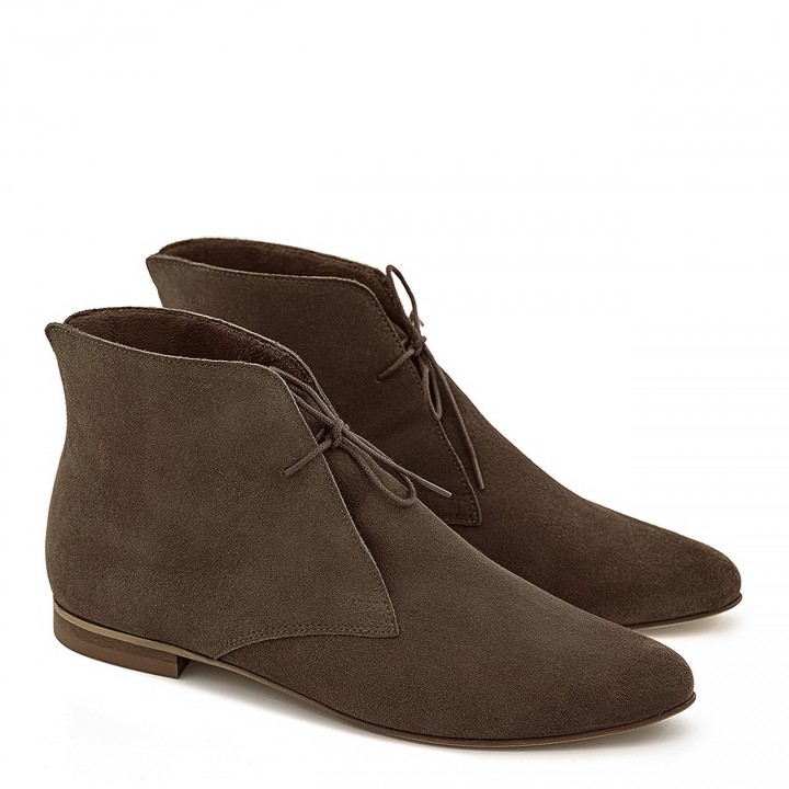 Brown flat-soled ankle boots made of natural velour leather