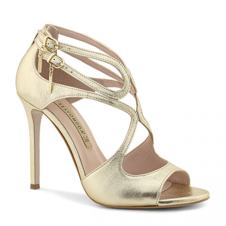 Unique gold leather sandals on a high heel with original cutouts