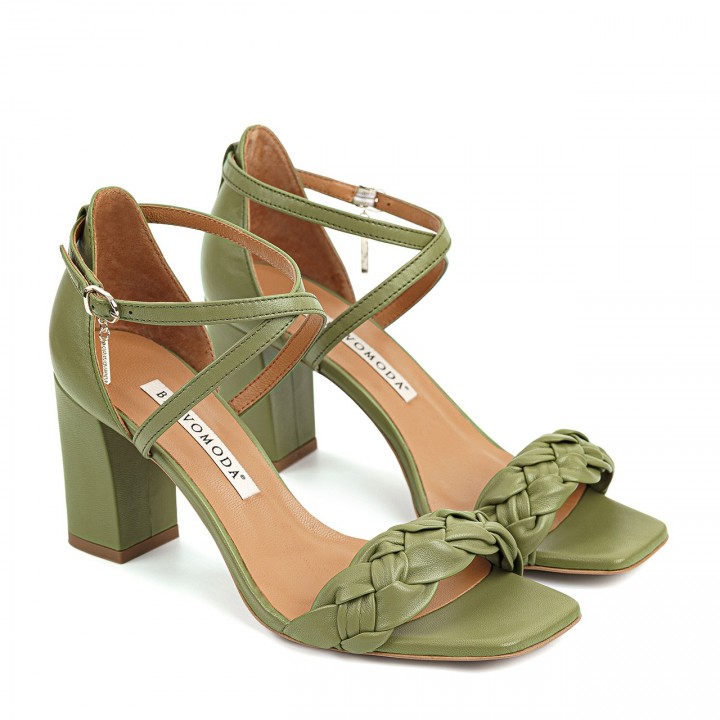 Leather sandals with a strap around the ankle