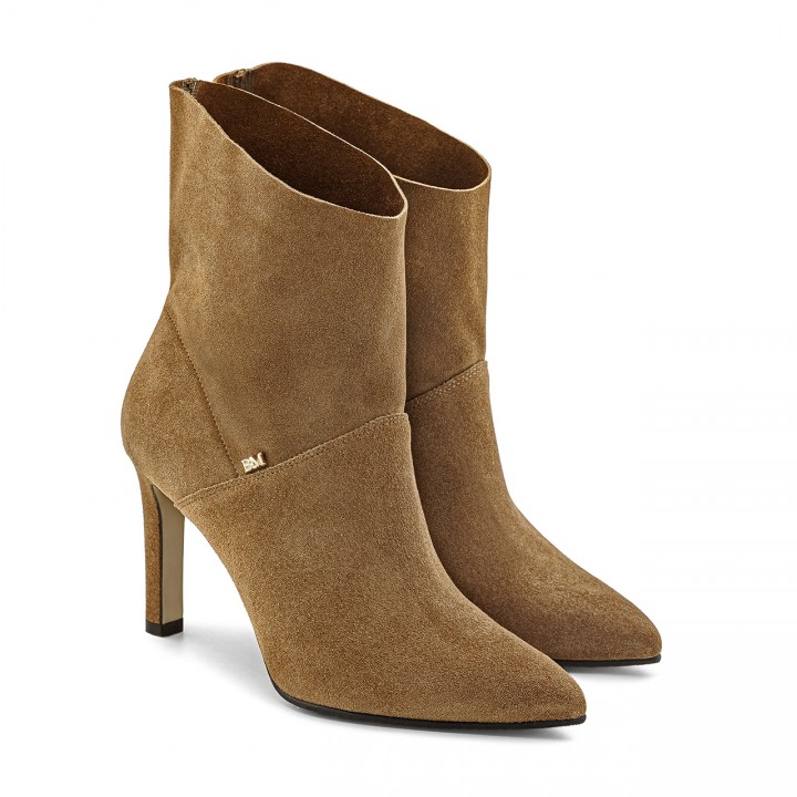 Beige velour leather ankle boots with a high heel