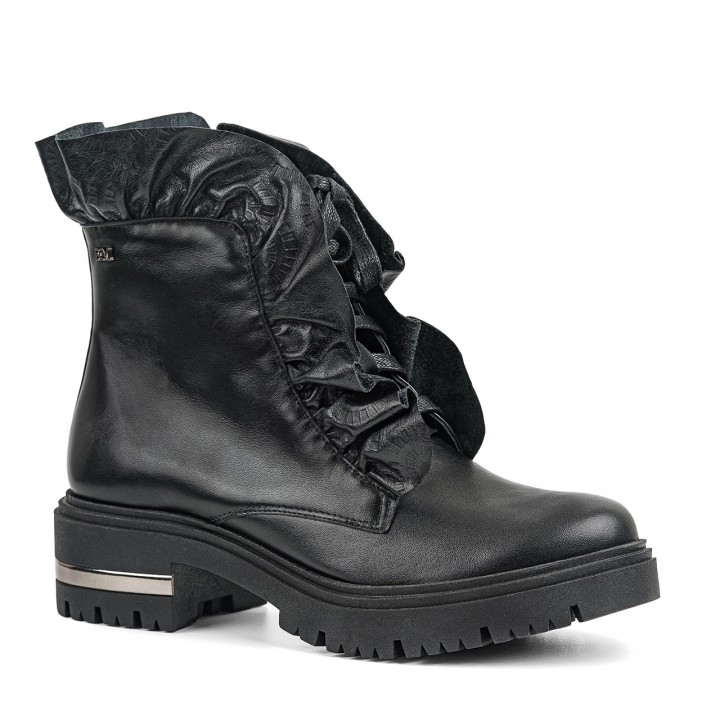 Black leather ankle boots with a thicker sole and a ruffle