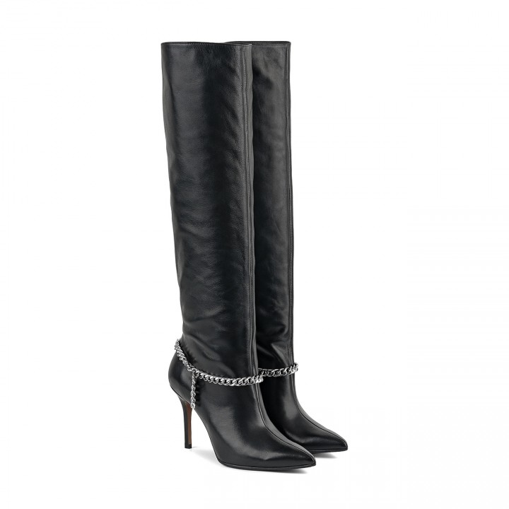 Black leather over-the-knee boots with a decorative chain