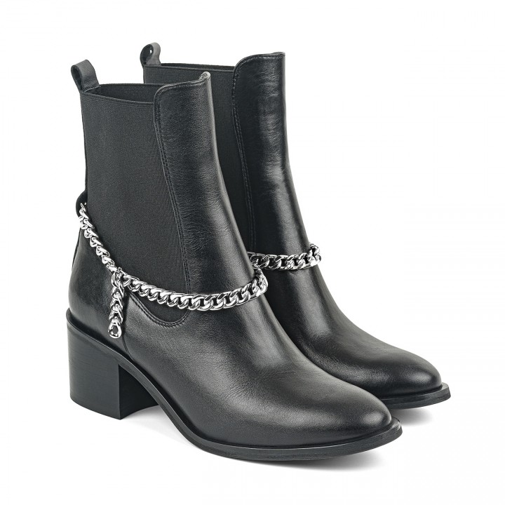 Black leather ankle boots with a stable heel