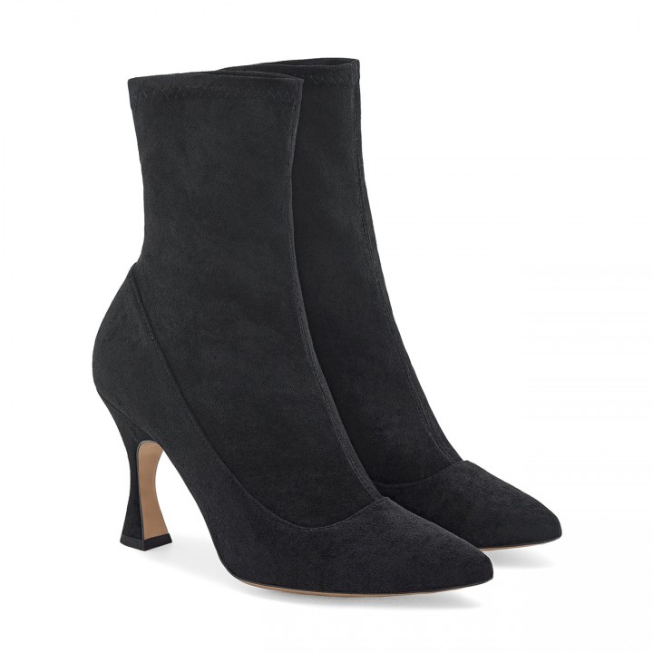 Black ankle boots with an interesting heel