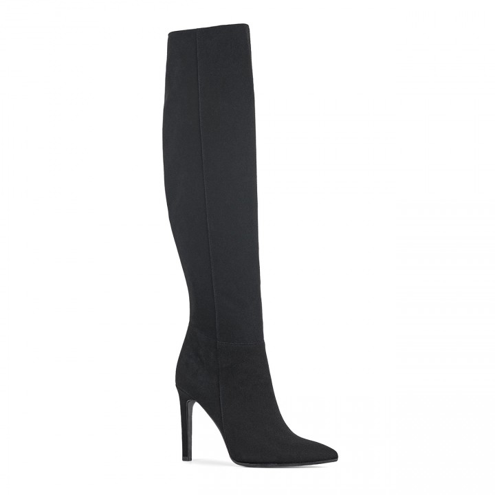 Black suede knee-high boots with a high heel and a zipper