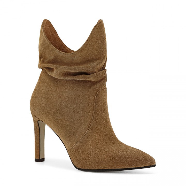 Beige ankle boots made from natural velour, with a high stiletto heel