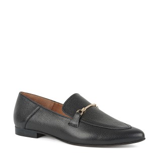 Black loafers with a flat sole and a gold ornament at the front