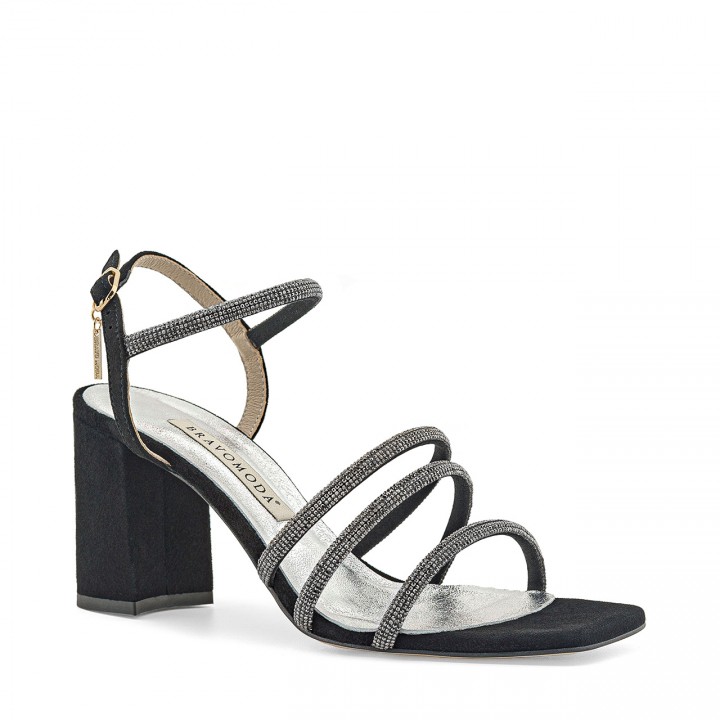 Black suede sandals with a stable block heel and decorative straps