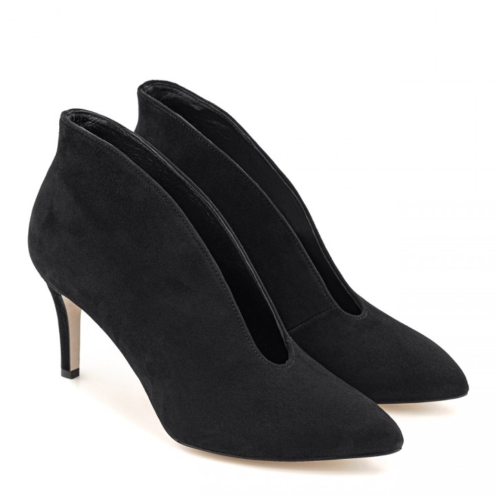 Black suede ankle boots with a stiletto heel and a cutout at the front