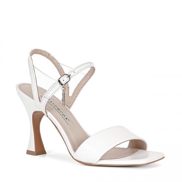 White sandals made from genuine grain leather with a geometric heel measuring 9 centimeters in height