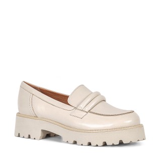 Cream-colored leather moccasins with a high sole and rounded toes