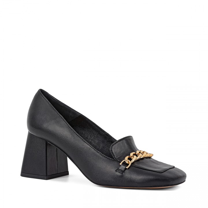 Black leather moccasins in black color with a wide heel and a gold ornament