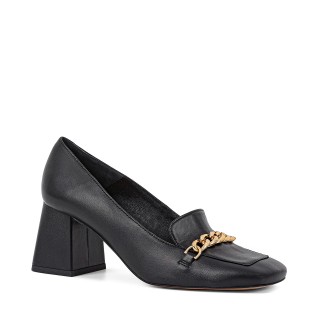 Black leather moccasins with a gold ornament on a wide heel