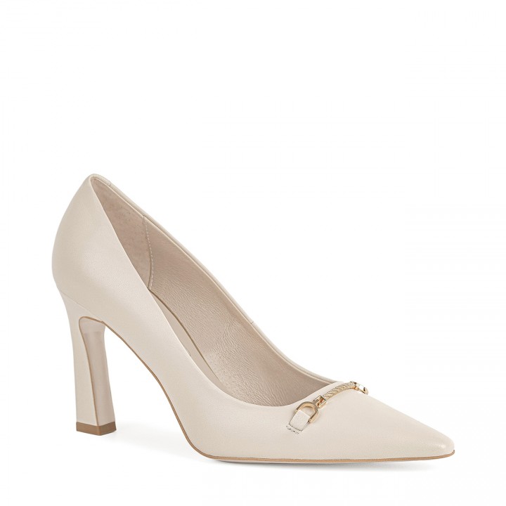 Elegant cream-colored pumps with a subtle decoration made from genuine grain leather