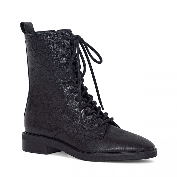 Black leather ankle boots with front lacing and an additional zipper on the inside