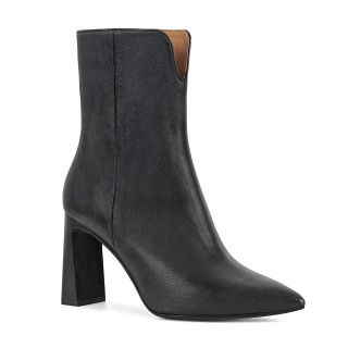 Black leather ankle boots with a wide heel and subtly pointed toes