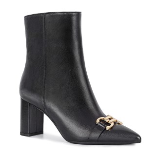 Black leather ankle boots with pointed toes and gold decoration