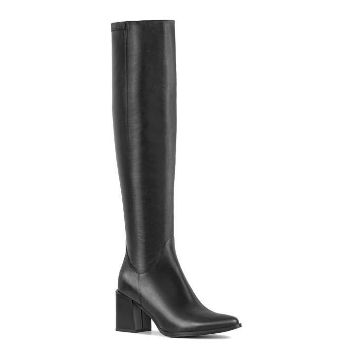 Black boots with a flexible upper and a stable heel