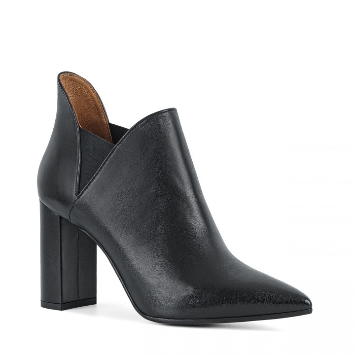 Black ankle boots with a high and stable heel made of natural grain leather