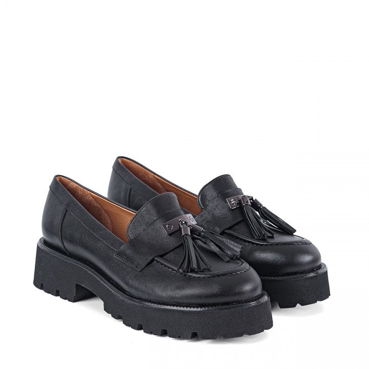 Natural grain leather black moccasins featuring a thick sole