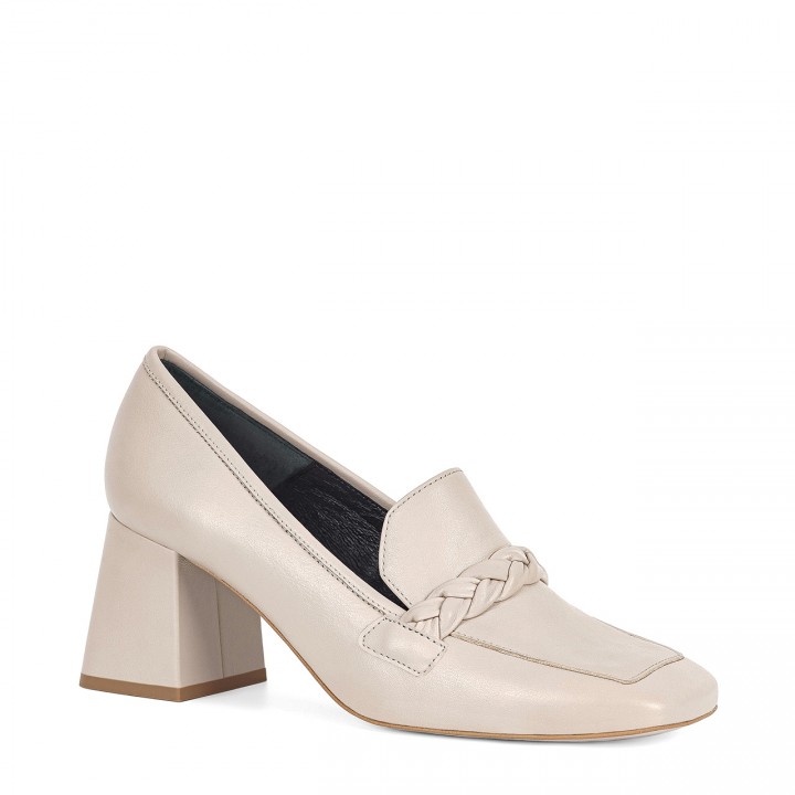 Pumps made of natural ivory cowhide with a high heel