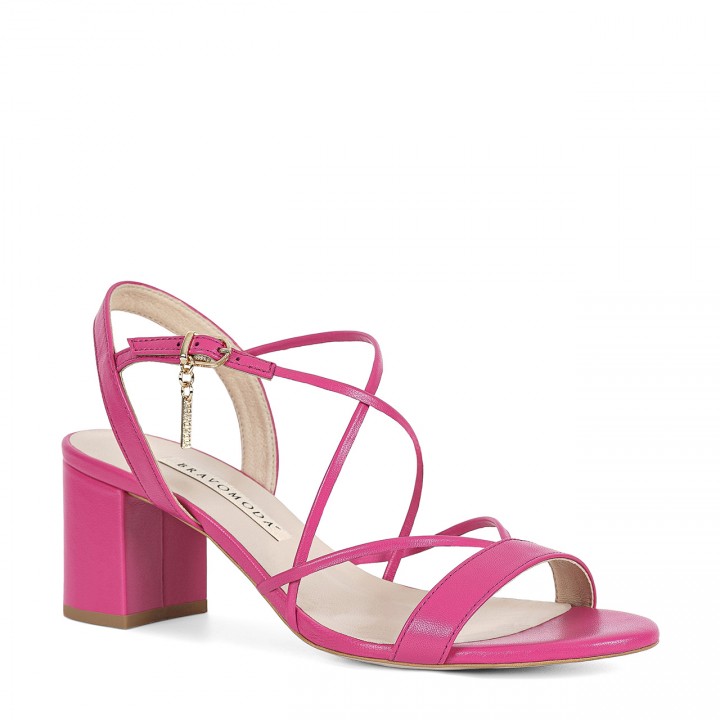 Sandals made of natural fuchsia goat leather with a high heel