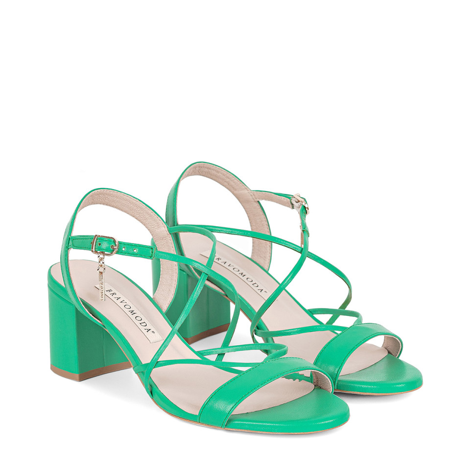 Block heel sandals made of natural grain leather in a delicate green color