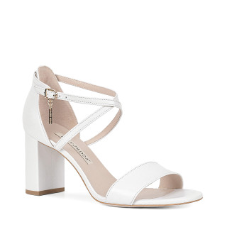 Classic white sandals with a comfortable block heel made of natural leather