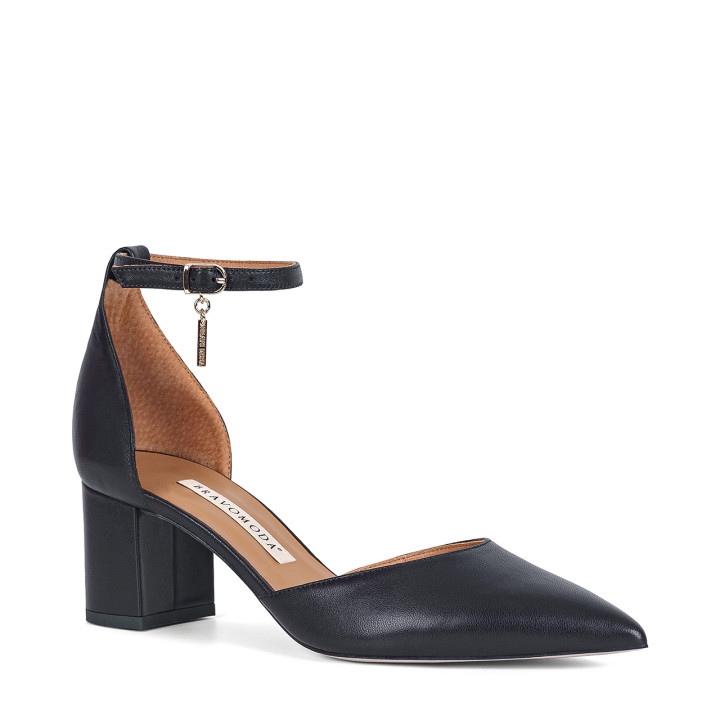 Black leather block heeled pumps with a strap around the ankle, made of natural grain premium leather