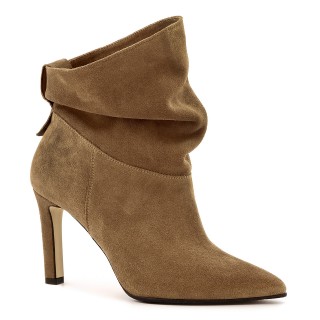 Beige velour leather ankle boots with a stiletto heel and a loose shaft