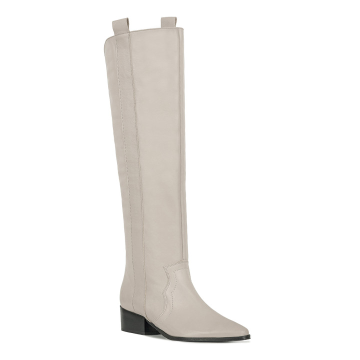 Woman’s top boots made of natural, ivory-colored grain premium leather
