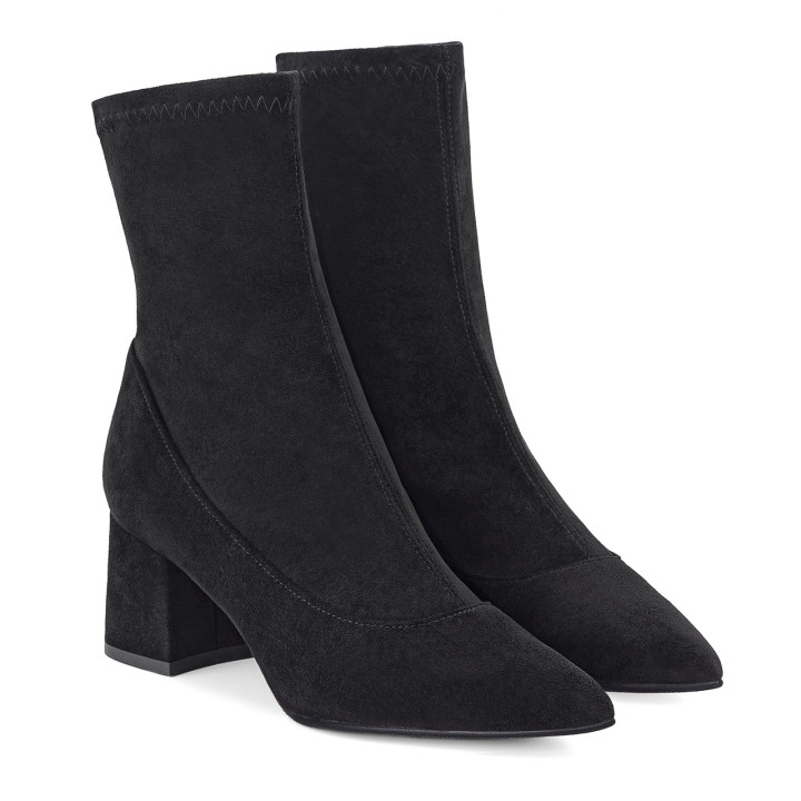 Black fitted ankle boots with a low heel