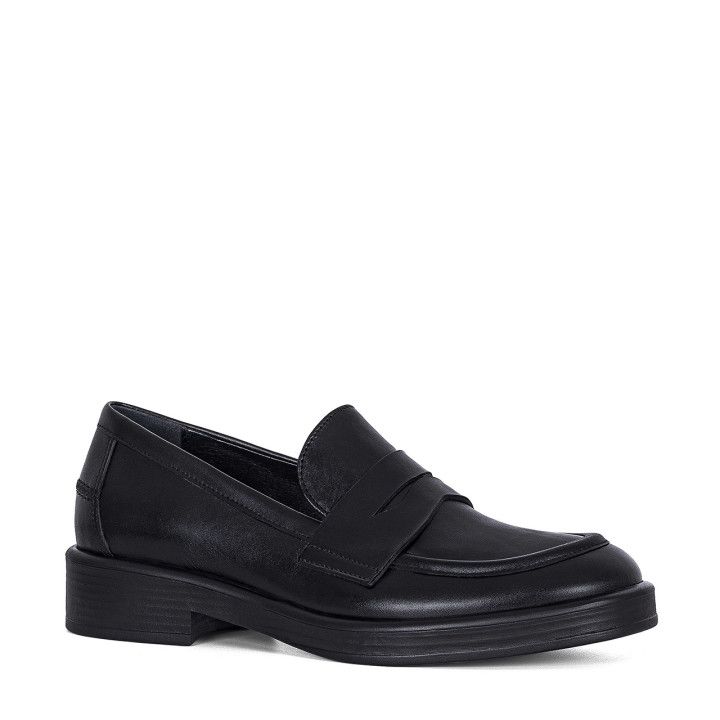 Black moccasins with a light sole made of natural grain leather