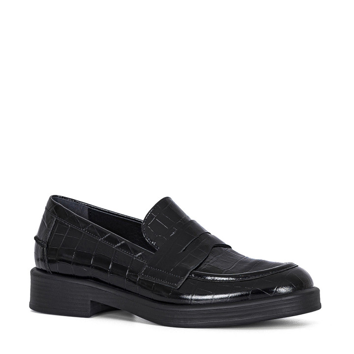 Black moccasins with a flat sole made of natural leather with crocodile embossing