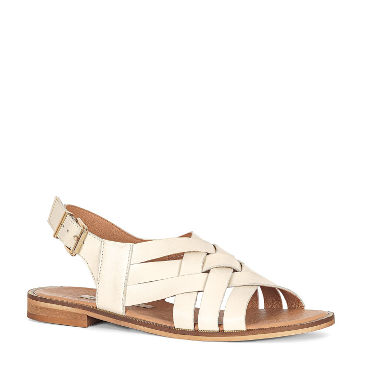 Cream sandals made of natural grain leather with a flat sole