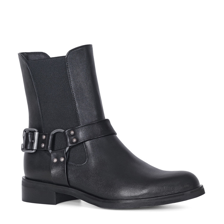 Black leather ankle boots with a flat sole and decoration