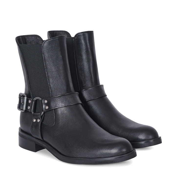 Black leather ankle boots with a flat sole