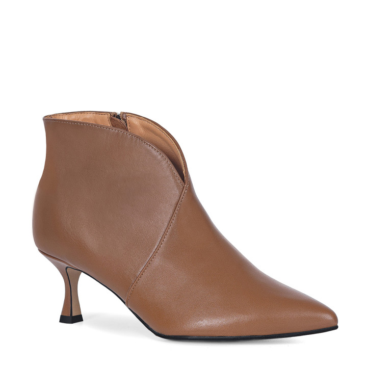 Brown ankle boots on a low heel with a geometric upper made of natural grain leather