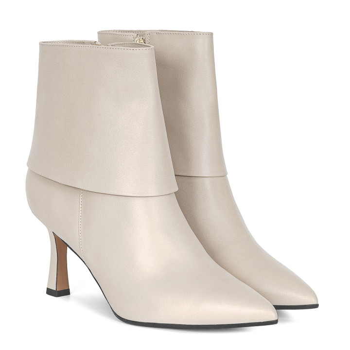 Leather ankle boots with a falling upper in ivory color