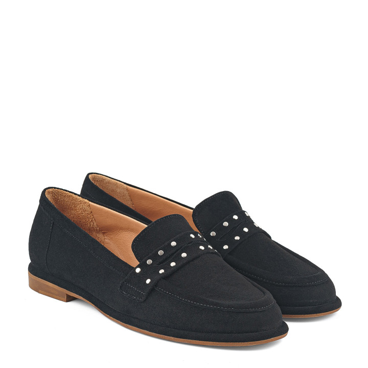 Suede moccasins with studs and a flat sole