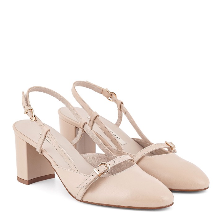 Beige pumps made of natural grain leather on a high heel with an open heel