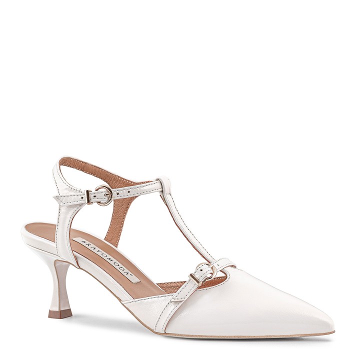 White pumps made of natural leather with a low heel and open heel and sides