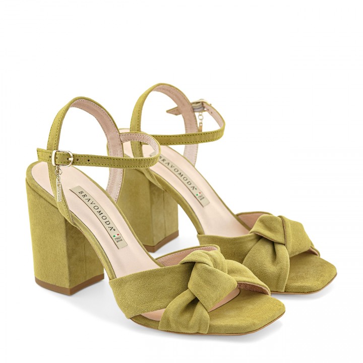 Lime-colored sandals with a decorative knot