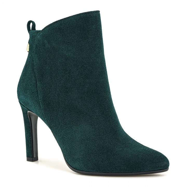 Green ankle boots with a high heel made of natural velour leather with a decoration on the heel