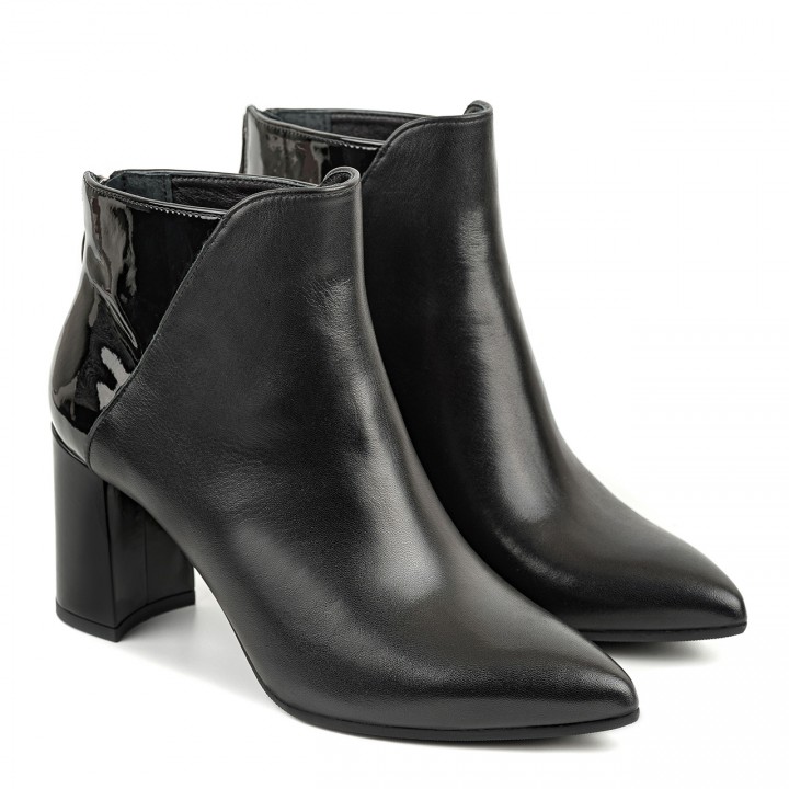 Black ankle boots made of natural grain leather with some patent leather